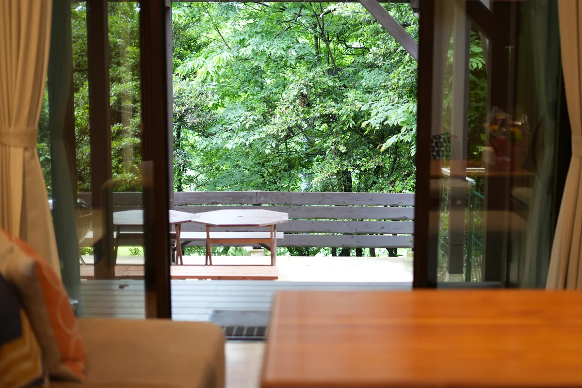 Exterior of a cottage with a deck